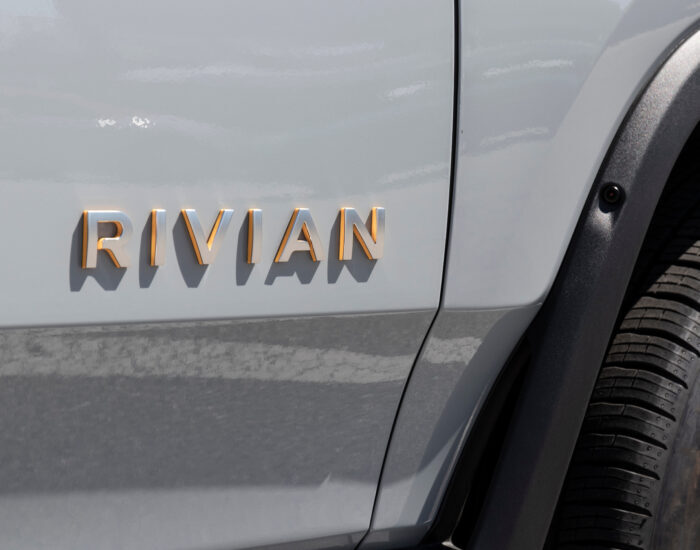 Indianapolis - Circa August 2022: Rivian R1T Pickup Truck display at a dealership. Rivian offers the R1T in Explore, Adventure and Launch models.